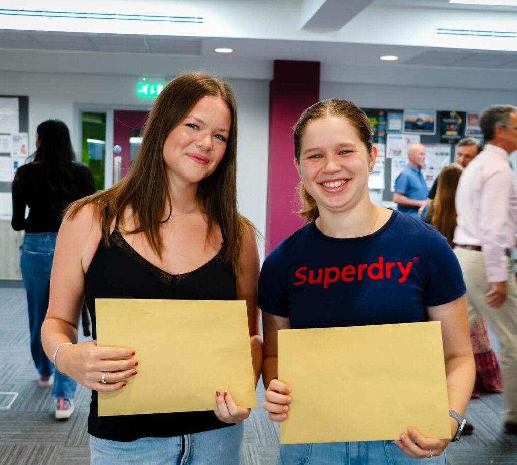 Sixth Form Results Day, happy students.