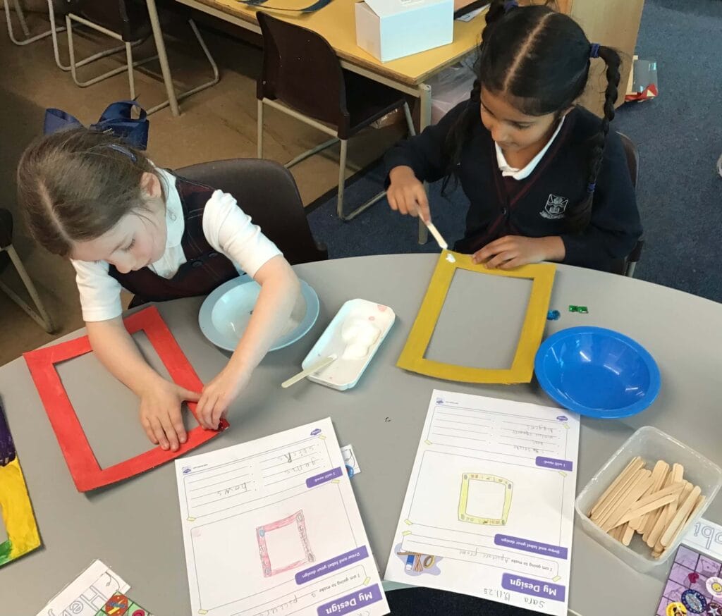 Young children doing arts and crafts.